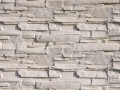 White cladding tiles imitating stones