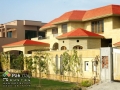 11-exterior-flat-red-clay-roof-tiles-house designs-pictures-gallery