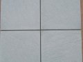 parking-area-riven-concrete-pavers-slabs-tile-stock-images